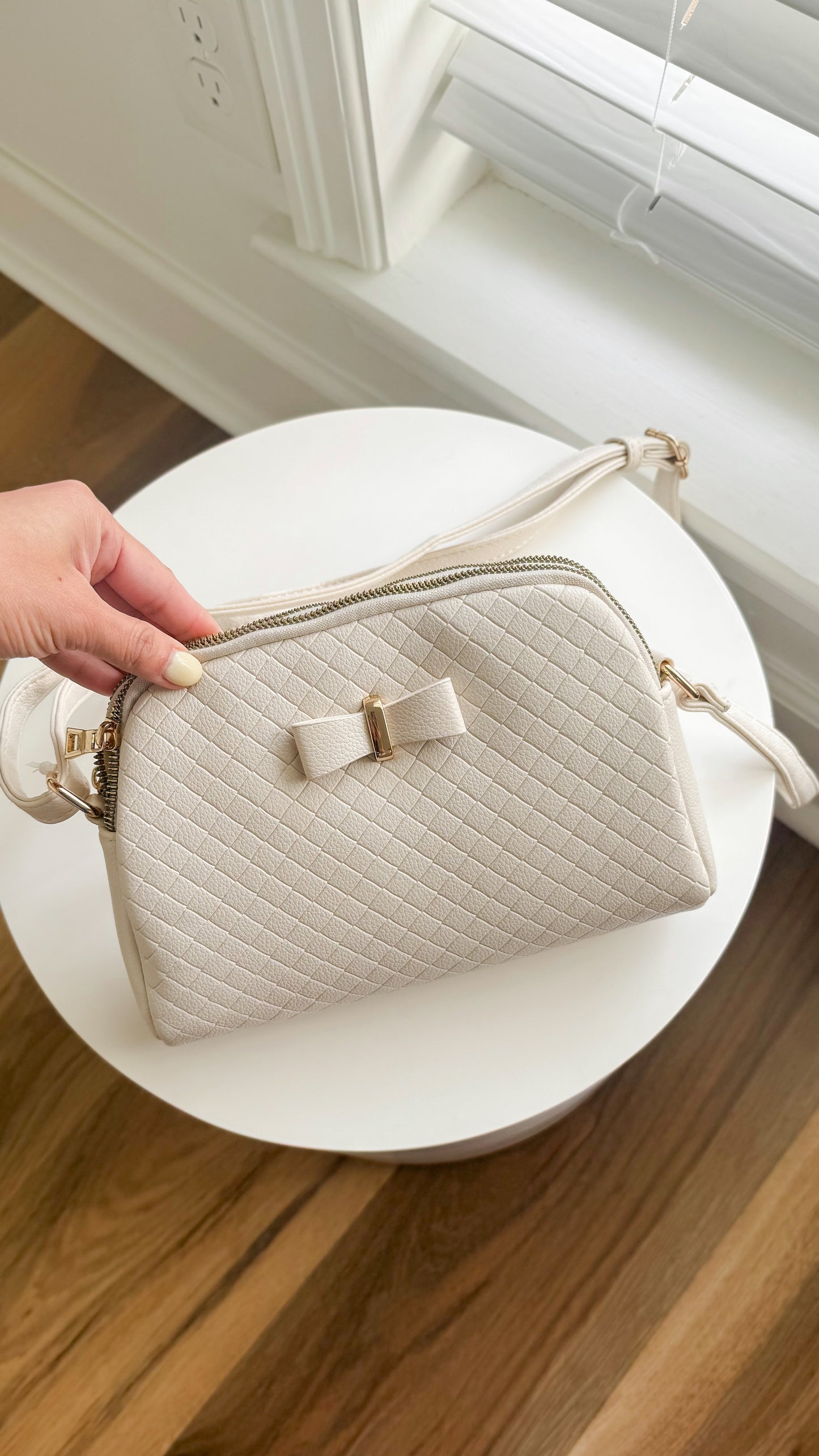 Lorie Woven Bow Crossbody Bag