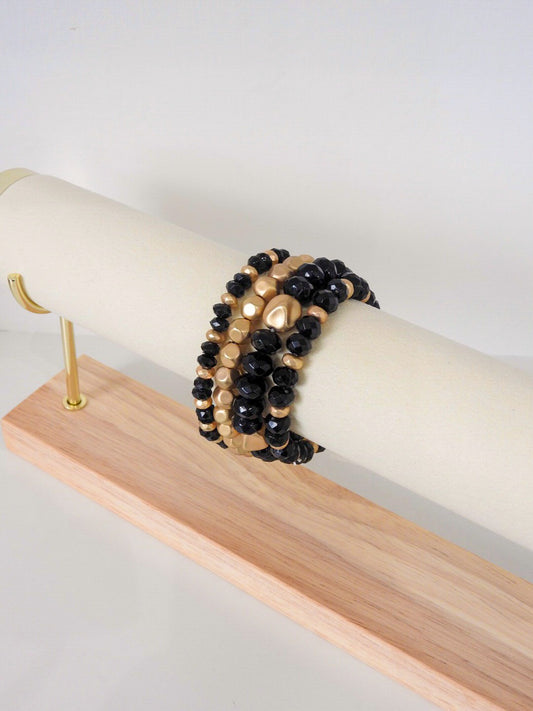 Four Piece Black & Gold Bracelet Set